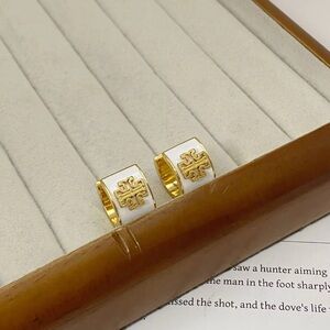 Tory Burch White Enamel and Gold Logo Huggie Earrings